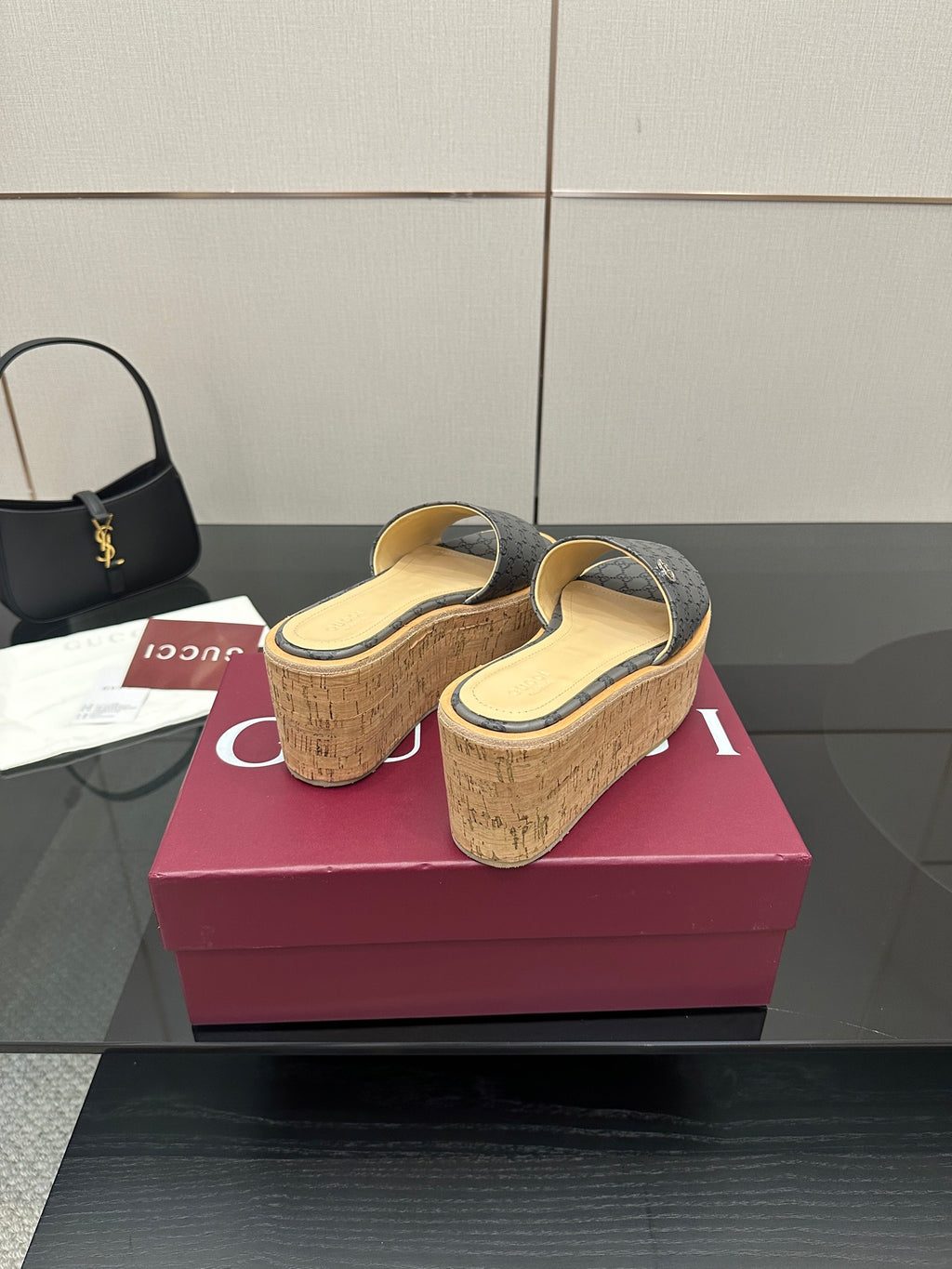 Gucci women’s platform slide sandals, gray GG canvas with cork wedge heel and sole