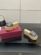 Gucci women’s platform slide sandals, gray GG canvas on cork wedge sole, side view