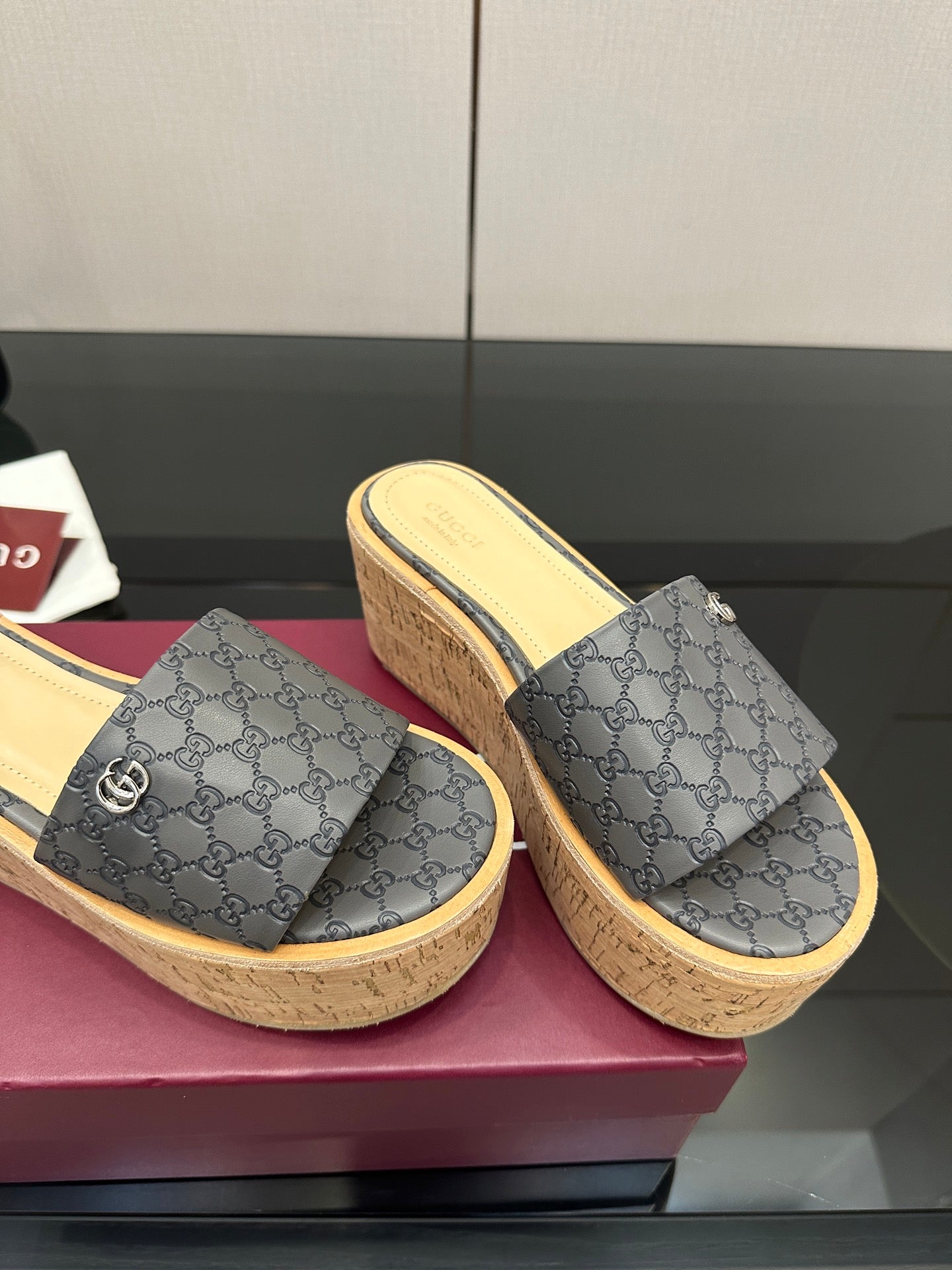 Gucci women’s platform slides, gray GG canvas with cork wedge sole and light trim
