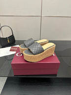 Gucci women’s slide sandals, gray GG canvas straps on cork platform wedge