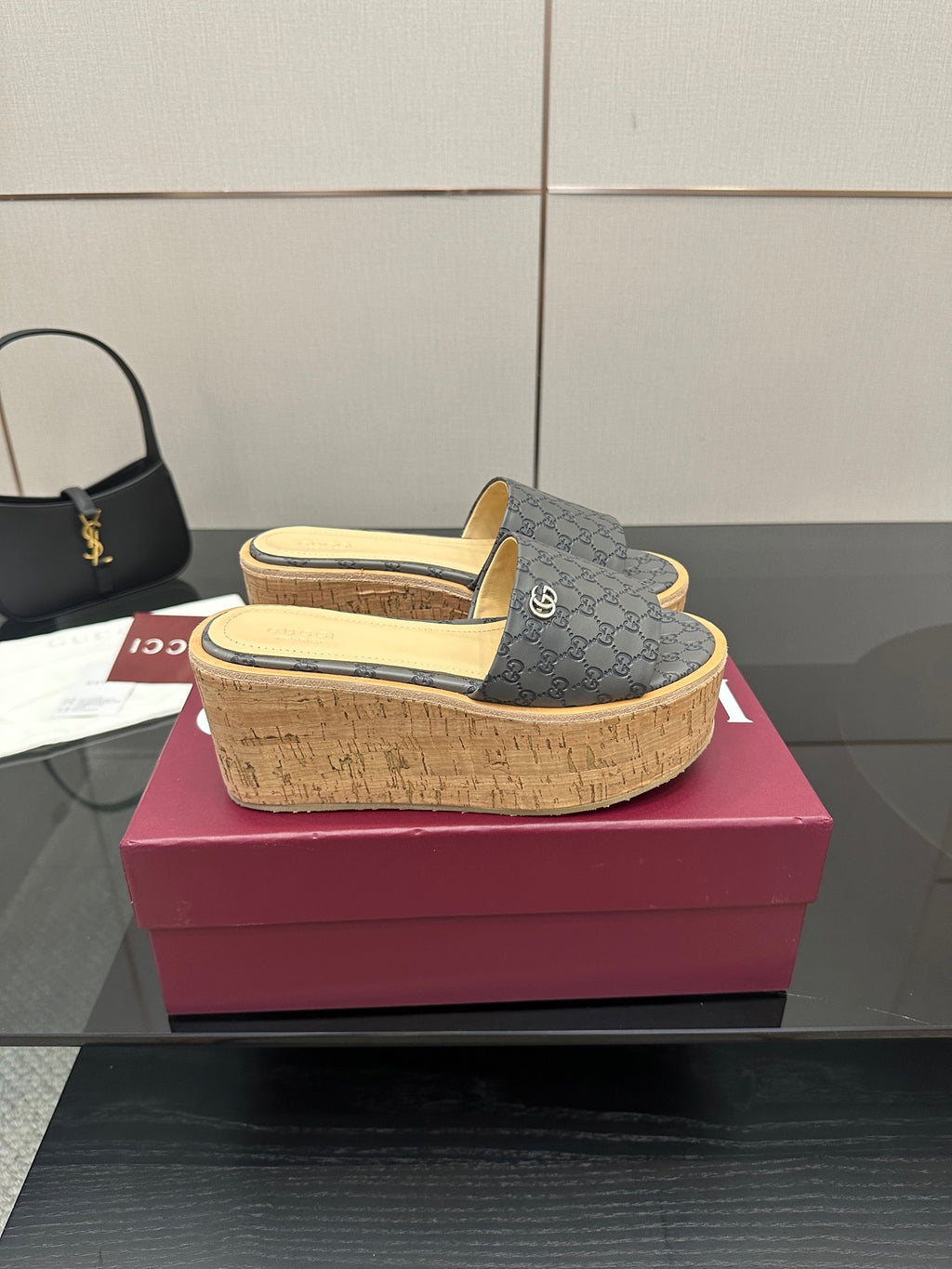 Gucci women’s slide sandals, gray GG canvas upper on cork platform wedge