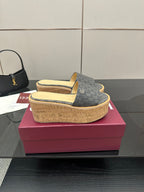 Gucci women’s slide sandals, gray GG canvas upper on cork platform wedge