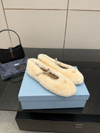 Prada ladies shearling loafers, cream plush slip-ons with gold top strap detail