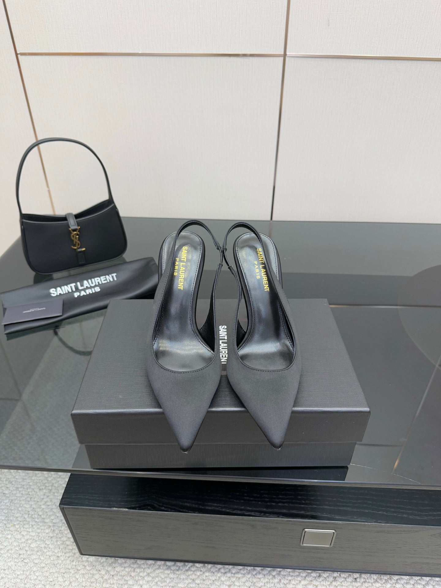 Women’s stiletto heeled pumps, dark leather, pointed toe
