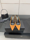 Orange pointed-toe high-heel pumps with stiletto heel and branded insole