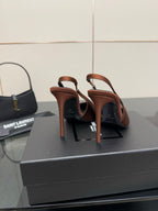 Two-tone slingback pumps with slim stiletto heels, brown and dark leather uppers