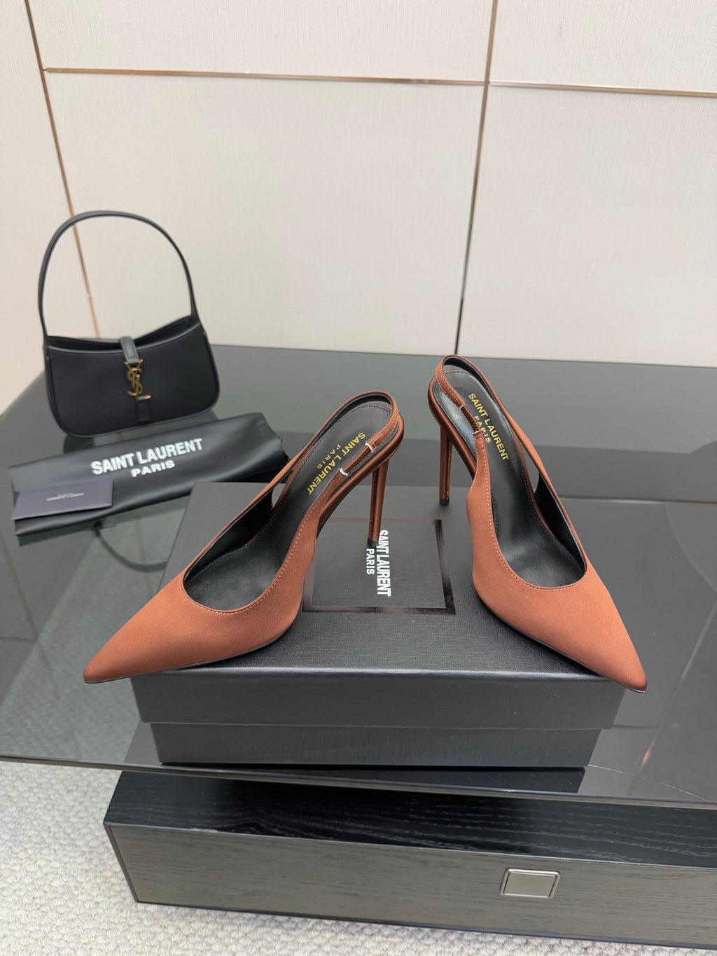 Two-tone pointed-toe slingback pumps with slim stiletto heels, brown and black