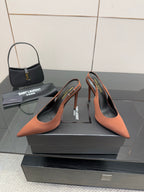 Two-tone pointed-toe slingback pumps with slim stiletto heels, brown and black