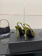 Ladies' lime green slingback stiletto pumps, side view on display