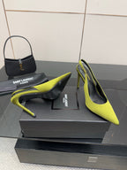 Ladies' lime green slingback stiletto pumps, black heel interior visible