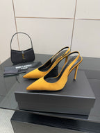 Yellow pointed-toe stiletto pumps with thin heel and black lining