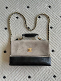 Chanel bag with chain strap, beige flap, black quilted base, gold CC clasp