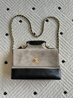 Chanel bag with chain strap, beige flap, black quilted base, gold CC clasp