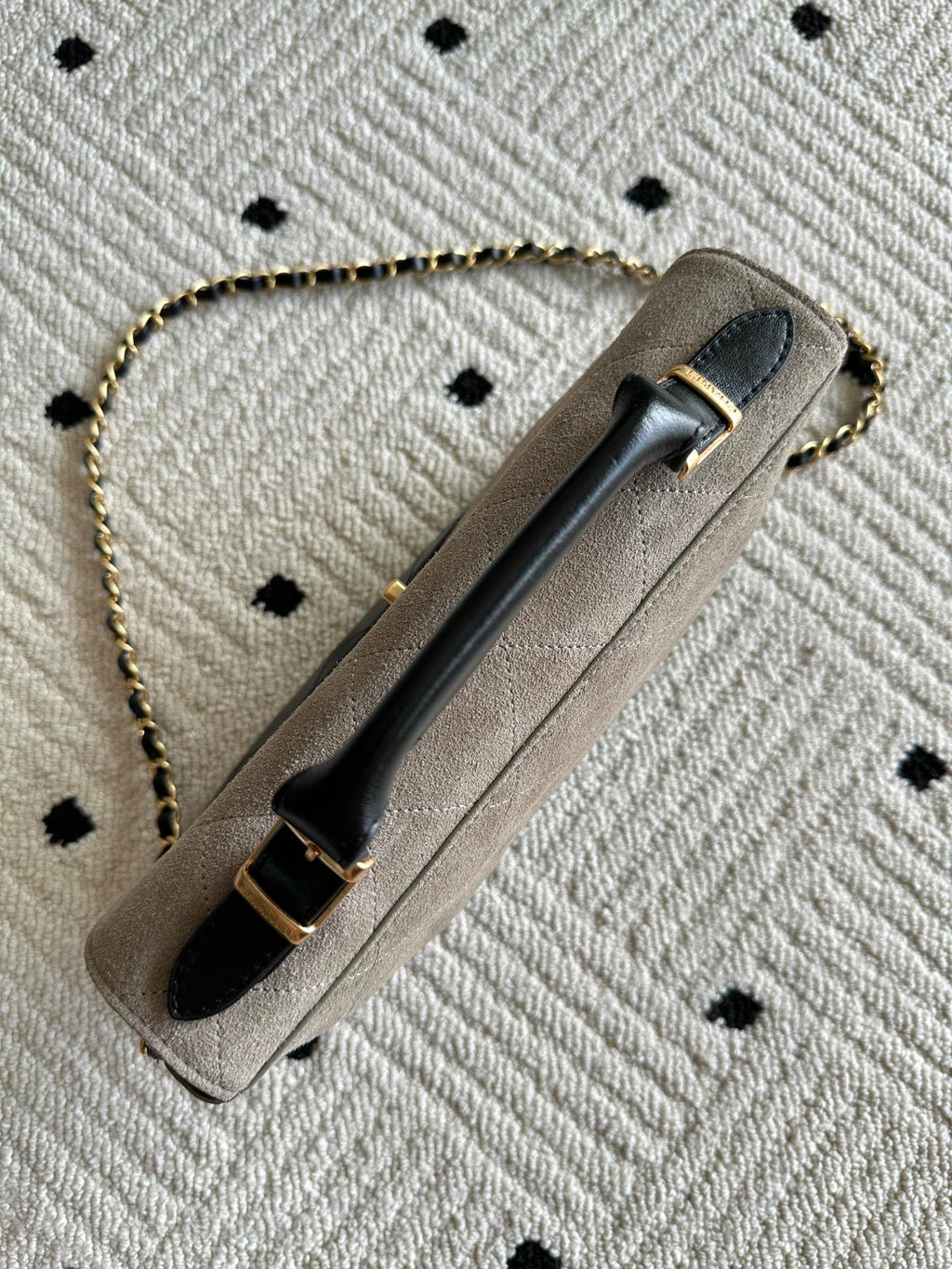 Chanel bag on chain strap with long handle, beige exterior and dark interior