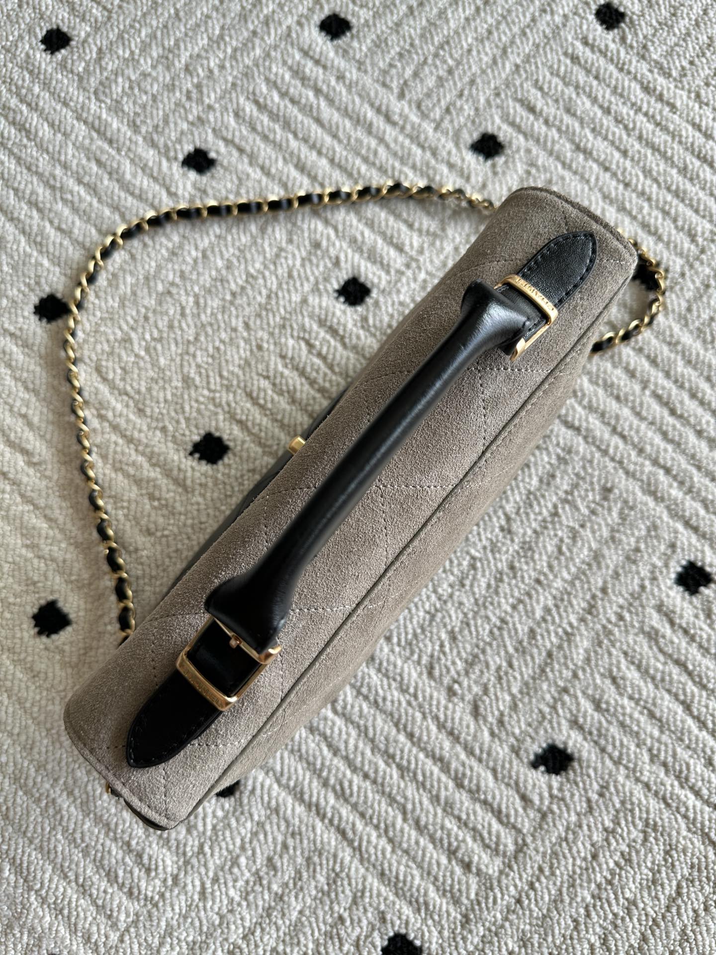 Chanel bag on chain strap with long handle, beige exterior and dark interior