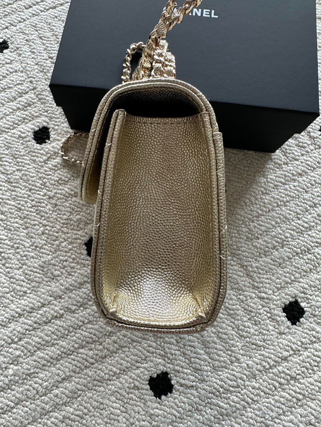 Chanel small top-handle bag in textured finish with chain strap and gold clasp