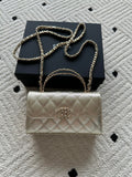 Chanel small quilted flap bag with chain shoulder strap and gold-tone hardware