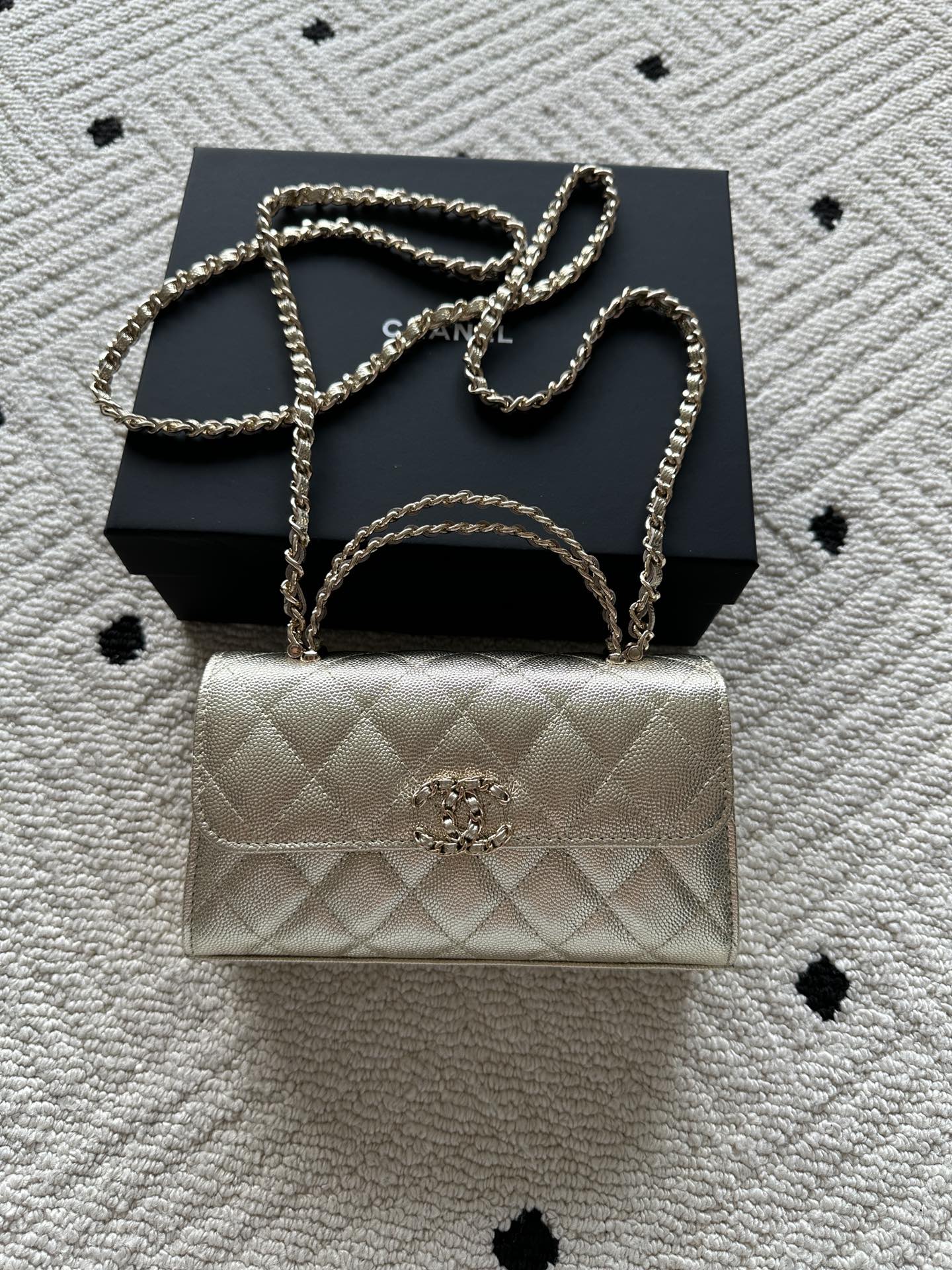Chanel small quilted flap bag with chain shoulder strap and gold-tone hardware