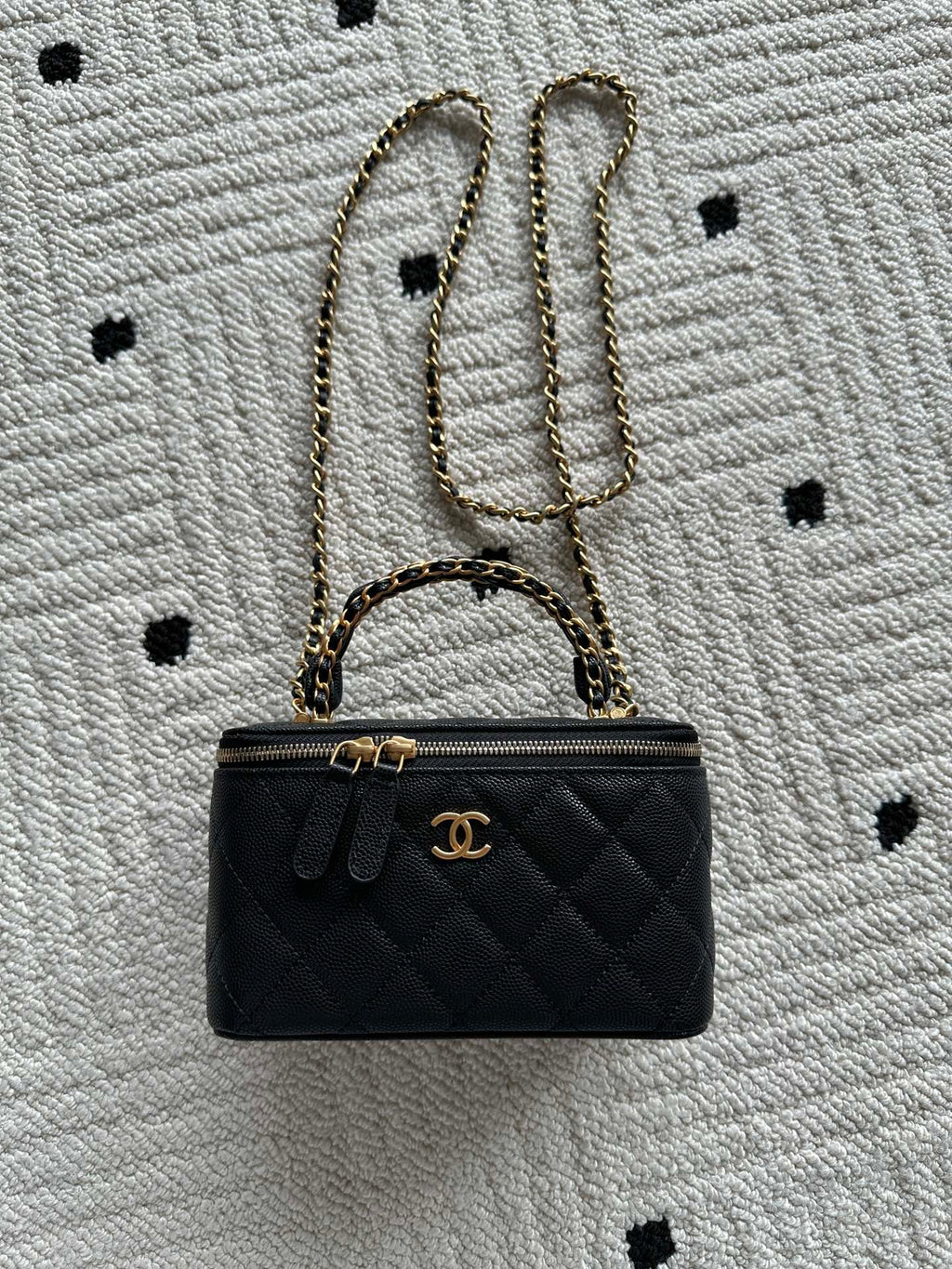 Chanel small quilted leather handbag with gold chain strap and CC front logo