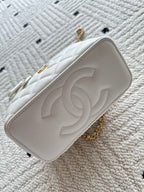 White quilted mini handbag with raised CC logo and short gold chain