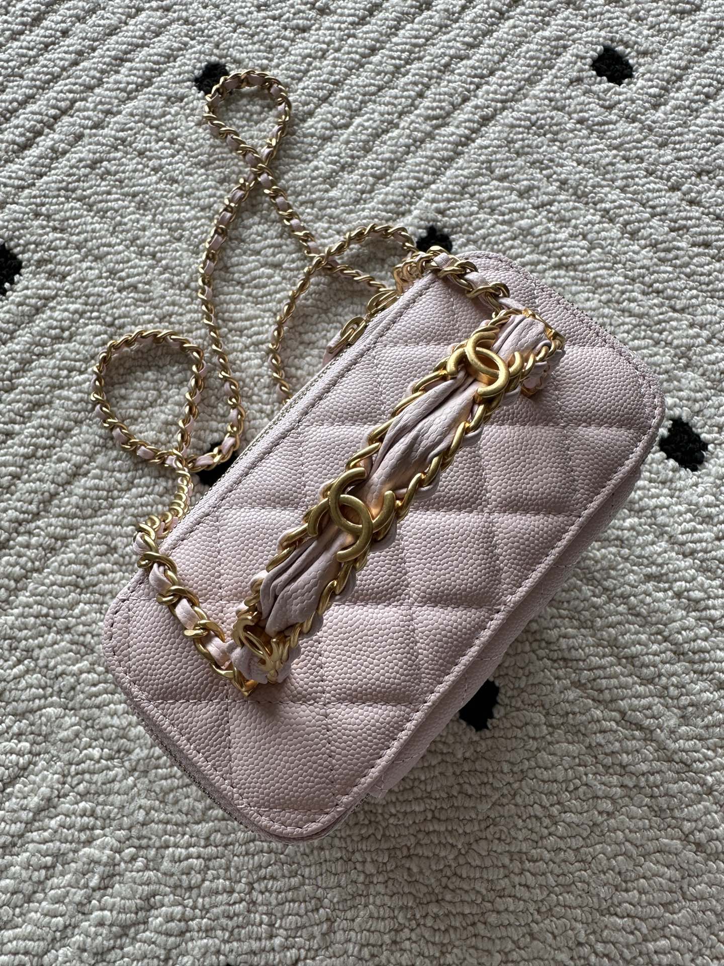 Chanel mini bag in pink with gold chain and front flap detail