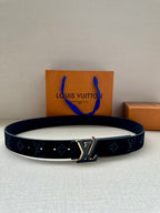 Louis Vuitton monogram belt with navy strap and gold-tone LV buckle