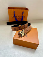 Louis Vuitton belt laid flat: brown monogram canvas strap with gold-tone buckle