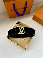 Dark blue monogram belt with prominent silver LV buckle; belt laid flat showing pattern.