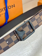 Damier check belt with dark leather trim and rectangular silver-toned buckle