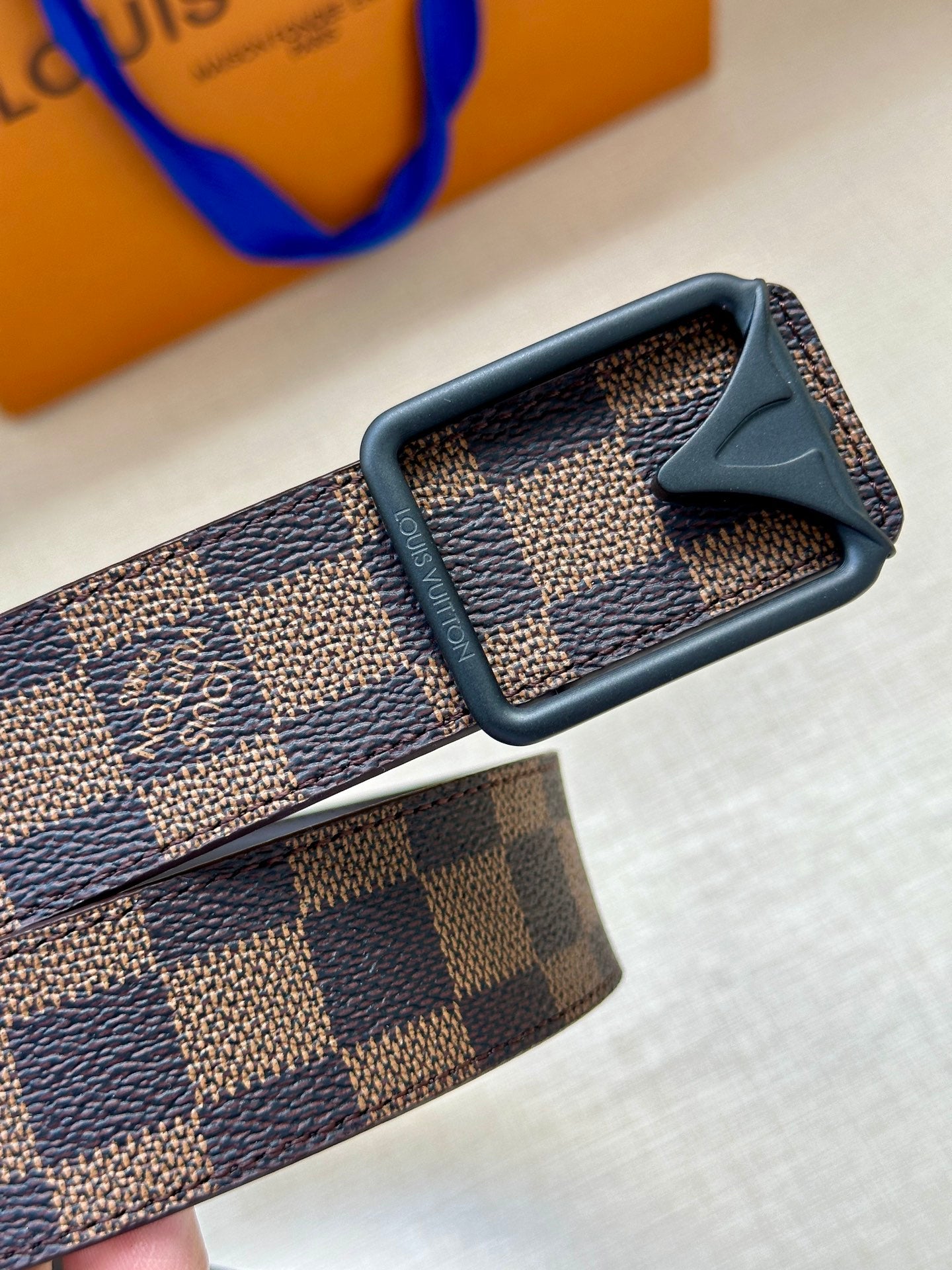 Damier check canvas belt with dark leather strap and silver-toned buckle