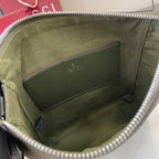 Crossbody bag interior lining with stitched leather panel and zipper top opening