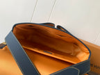 Louis Vuitton men's bag open top with orange lining and blue leather trim