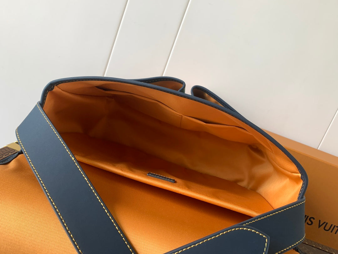 Louis Vuitton men's bag open top with orange lining and blue leather trim