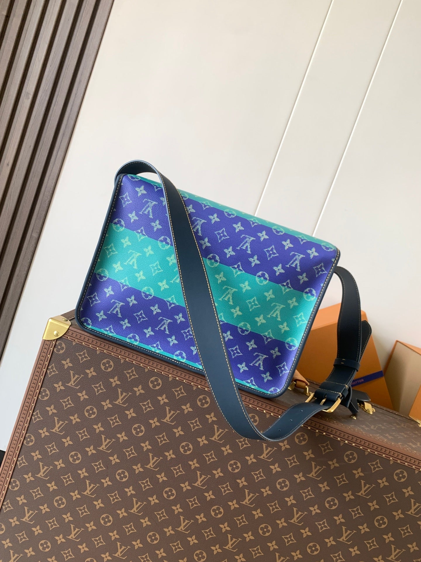 Louis Vuitton men's crossbody bag with multicolor monogram pattern and shoulder strap