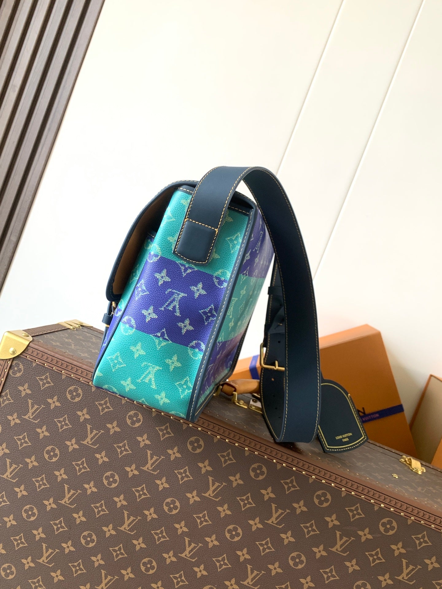 Louis Vuitton men's crossbody bag in multicolor monogram with top handle and strap