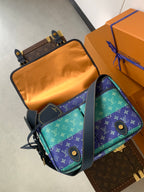 Louis Vuitton men's crossbody bag with multicolor monogram front and blue strap