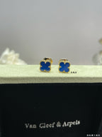 Clover enamel stud earrings with blue enamel and gold-tone settings