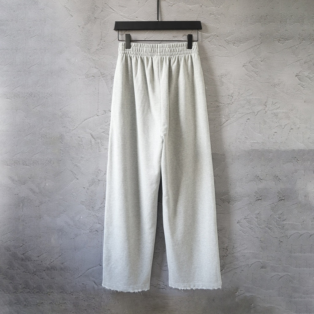 Balenciaga pants in light gray with loose straight legs and elastic waistband