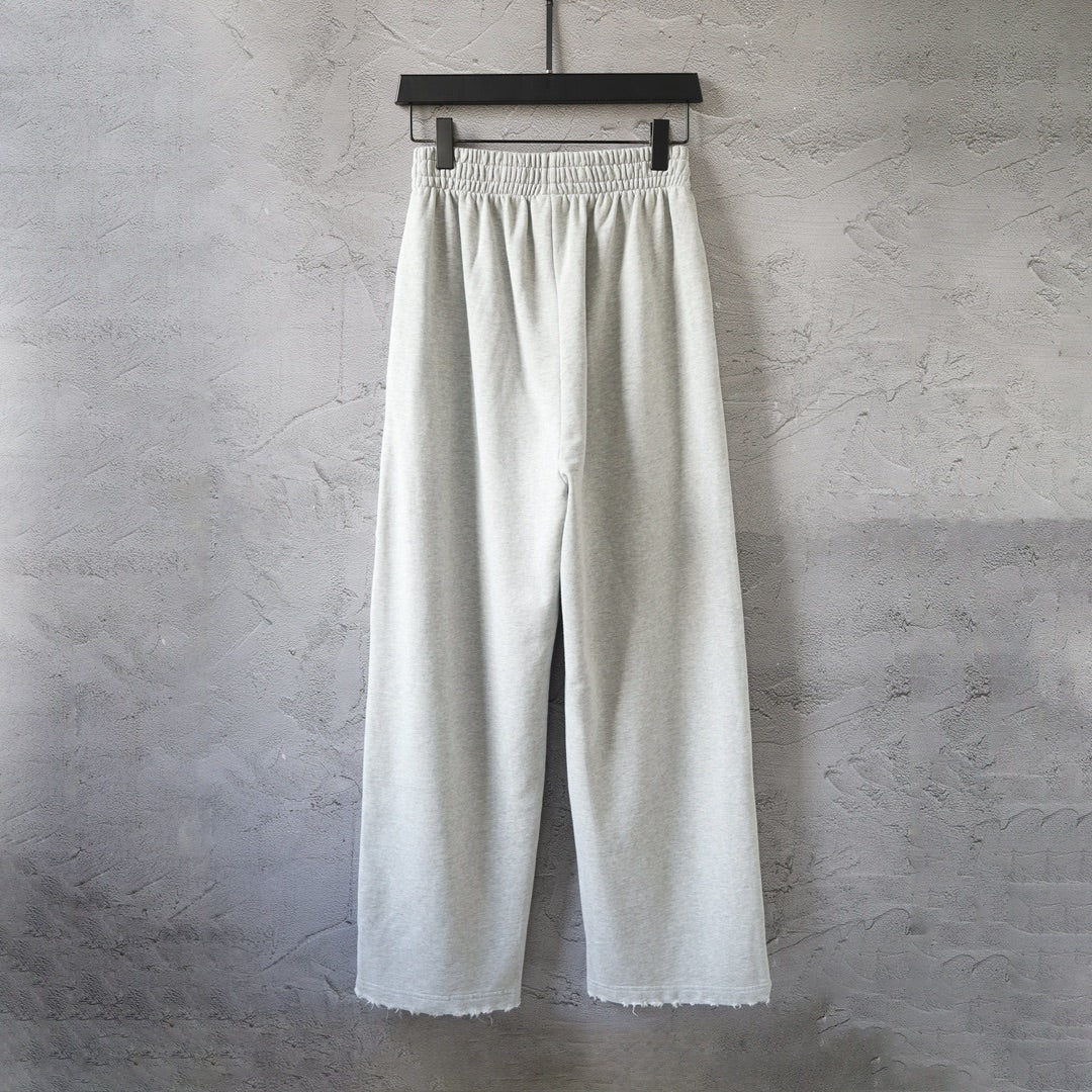 Balenciaga pants in light gray with loose straight legs and elastic waistband