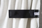 Balenciaga pants interior size label tag at waistband seam in light gray