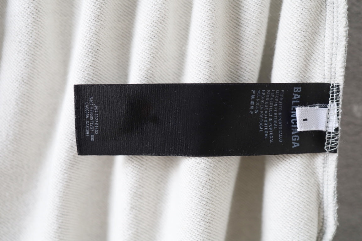Balenciaga pants with black brand size label on waistband