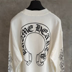 White long-sleeve T-shirt with large back circular headphones graphic, crew neckline