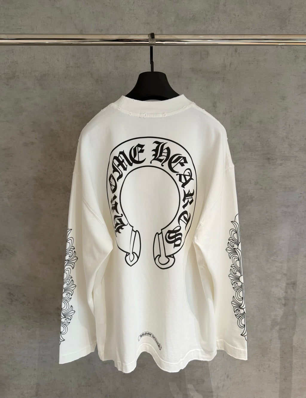White long-sleeve T-shirt with large back circular headphones graphic and sleeve prints