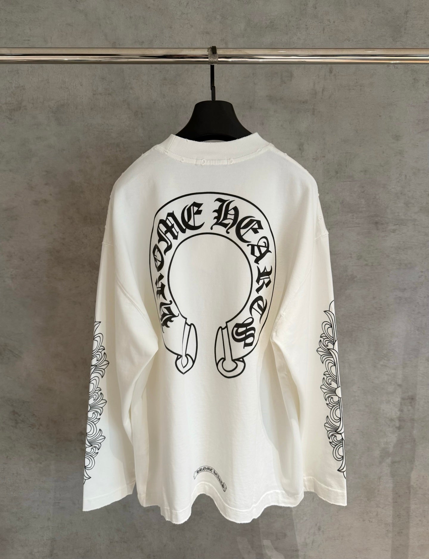 White long-sleeve T-shirt with large back circular headphones graphic and sleeve prints
