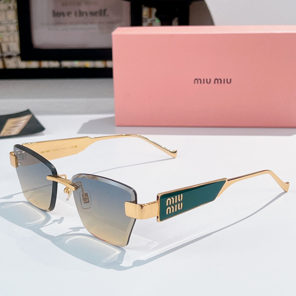 Glasses with gold-tone rectangular frames, gradient blue lenses, and miu miu logo temple