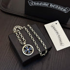 Silver-tone necklace with round blue star pendant and two chain links