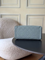 Chanel quilted flap bag, light blue top view with front CC logo