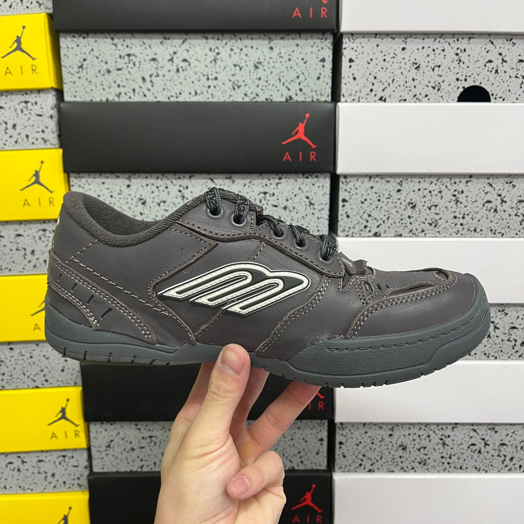 Grey Balenciaga lace-up sneaker front three-quarter view with side logo