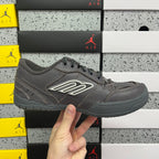 Grey Balenciaga lace-up sneaker front three-quarter view with side logo