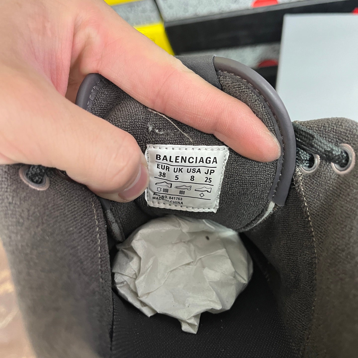 Grey Balenciaga sneaker size label inside the collar with 'UK 8.5' and '38'